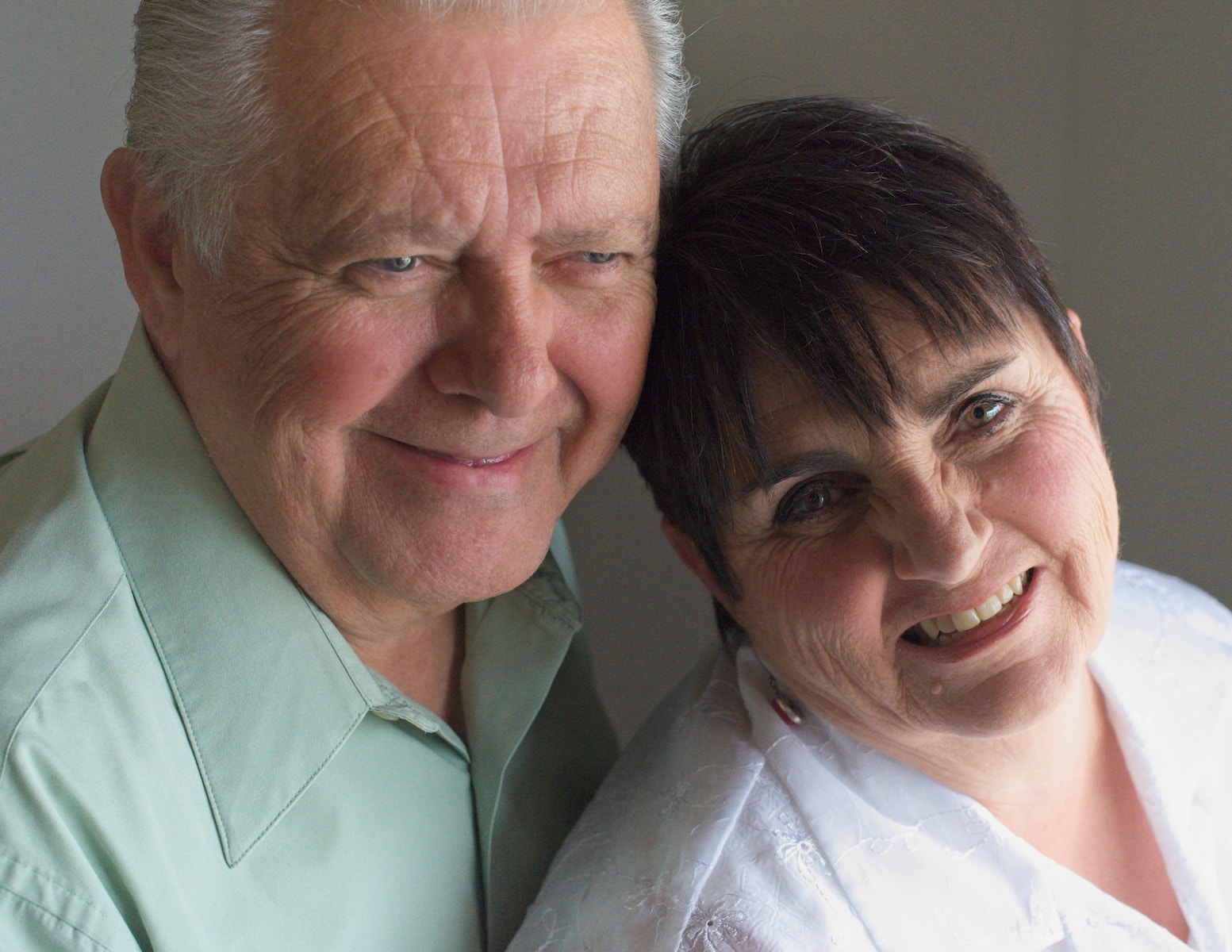 a man and woman smiling